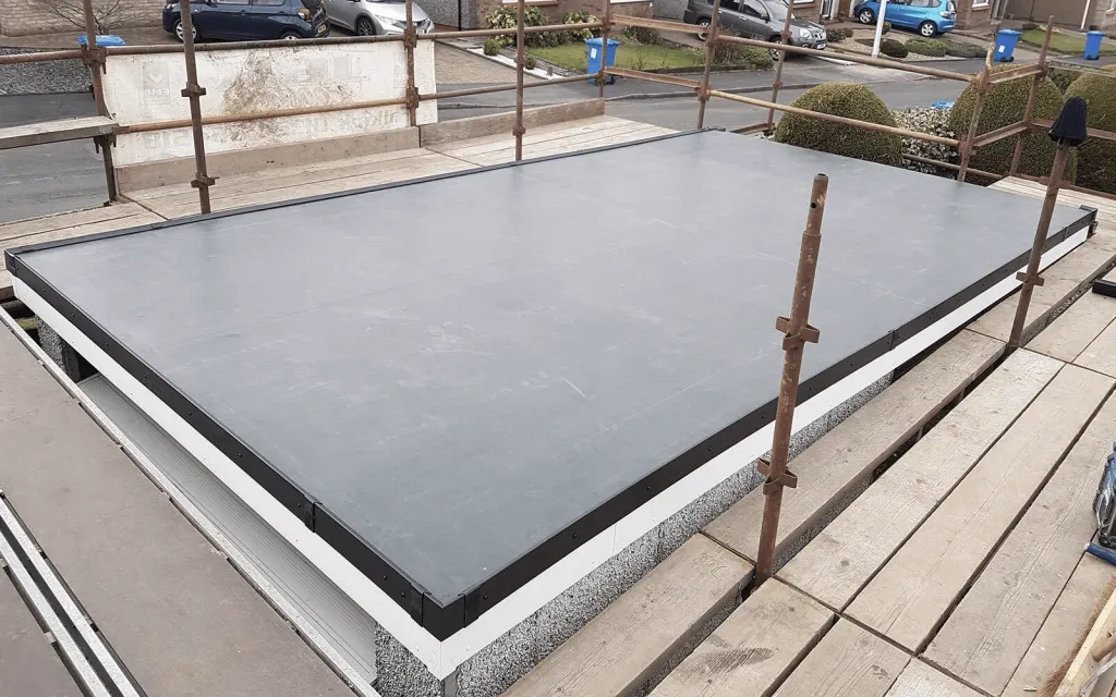 Completed EPDM flat roof installation by Cotsworld Roofing